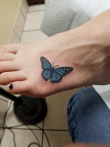 Find crown tattoo ideas for females for your next unique tattoo in Hillsboro at MOO MANU TATTOO