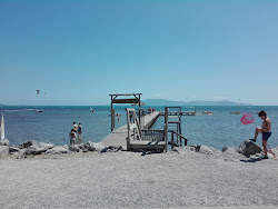 Spiaggia Molo di Talamone'in fotoğrafı - rahatlamayı sevenler arasında popüler bir yer