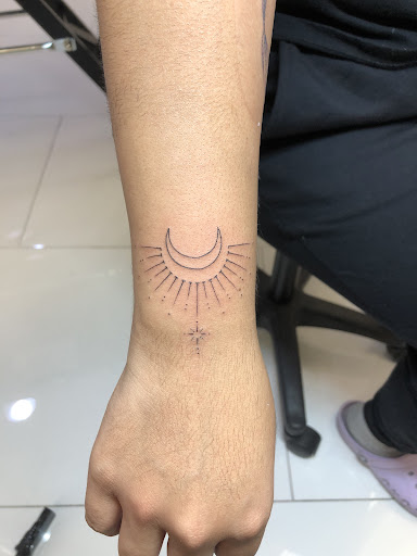 Explore butterfly arm tattoo ideas, creative tattoo ideas in Orange, available at Baron Art Tattoo