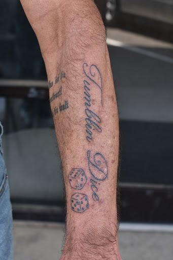 Explore tattoo name cover up ideas, creative tattoo ideas in Sanford, available at Hudson & Company Tattoo Studio