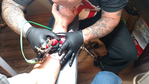 Tattoo Shop «SouthSide Tattoo Elyria», reviews and photos, 401 Broad St, Elyria, OH 44035, USA