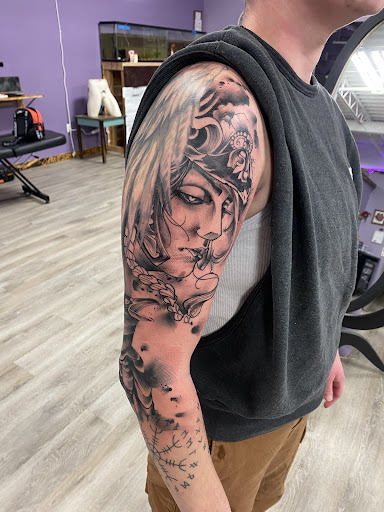 Explore tattoo ideas on calf, creative tattoo ideas in Sullivan, available at Double Time Tattoo