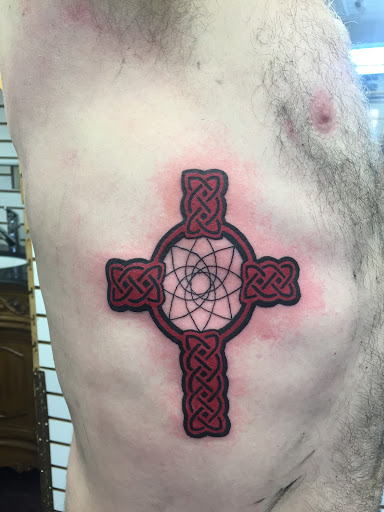 Explore tattoo ideas for the back of the neck, creative tattoo ideas in Eureka Springs, available at Sailors Luck Tattoo