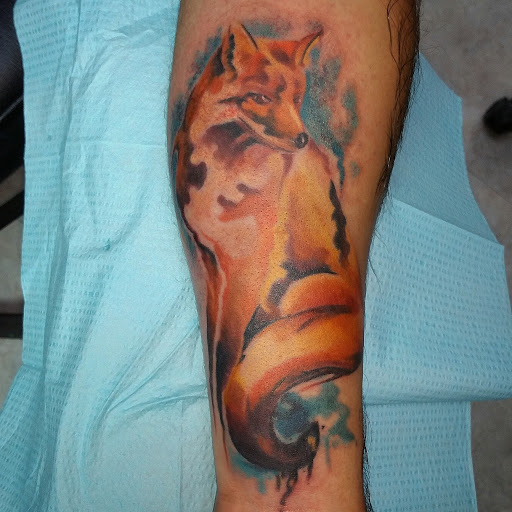 Explore lower arm tattoo ideas, creative tattoo ideas in Nashville, available at Titan Tattoo