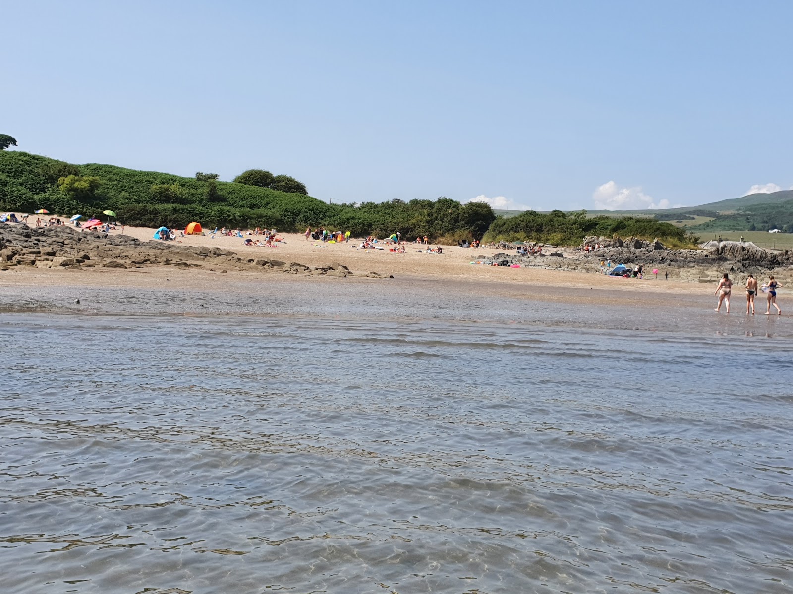 Photo of Mossyard Beach and the settlement