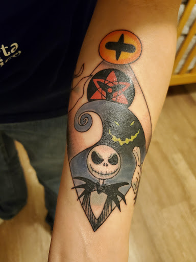 Explore bioshock tattoo ideas, creative tattoo ideas in Katy, available at Artistic Impressions Tattoo Studio