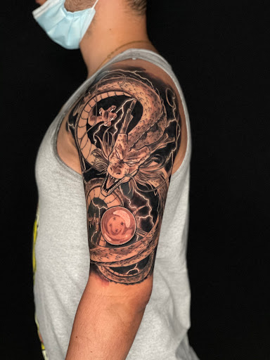 Explore ladies side tattoo ideas, creative tattoo ideas in Corona, available at Crop Circles Tattoo Studio