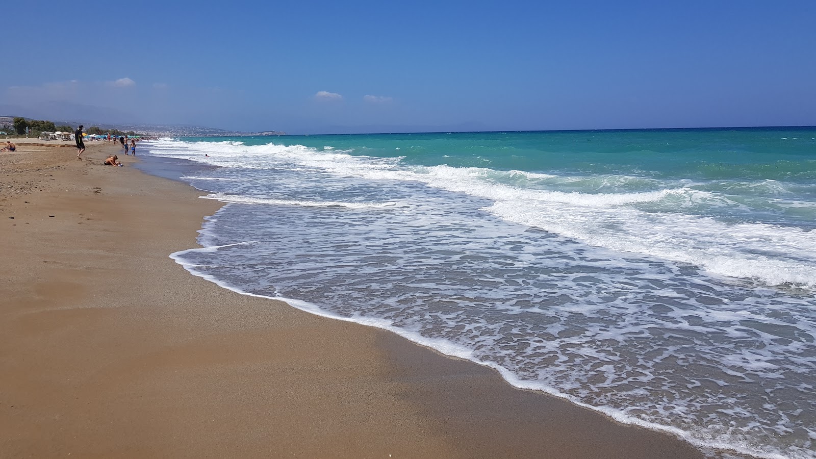 Fotografie cu Beach Adelianos Kampos - locul popular printre cunoscătorii de relaxare