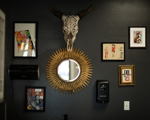 Find lion hand tattoo ideas for men for your next unique tattoo in Sturgis at Northern Hills Tattoo & Piercing