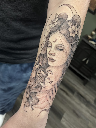 Explore tangled tattoo ideas, creative tattoo ideas in Sykesville, available at Foxwood Tattoo Collective