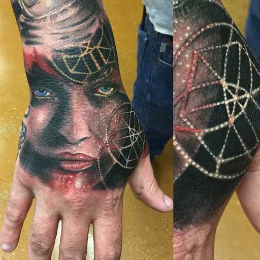 Explore cool hand tattoo ideas, creative tattoo ideas in Florissant, available at St. Louis Ink