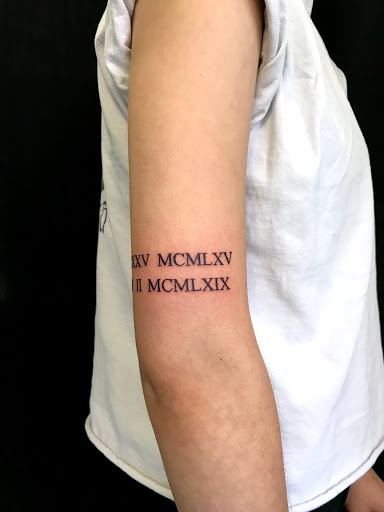 Find tattoo necklace ideas for your next unique tattoo in Carmel at Phong Tattoo