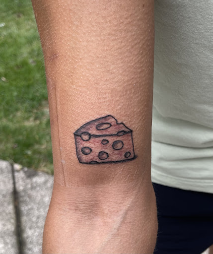 Explore lower arm half sleeve tattoo ideas, creative tattoo ideas in Buffalo, available at East Coast Ink