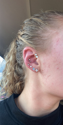 Explore father tattoo ideas for daughter, creative tattoo ideas in Lakeland, available at Holy Grail Tattoo