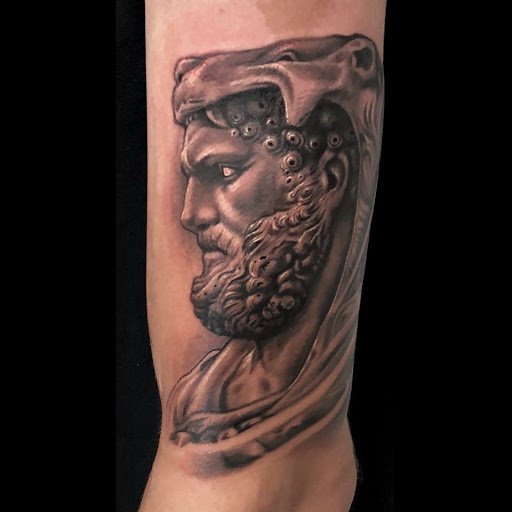 Explore bum tattoo ideas, creative tattoo ideas in Jeffersonville, available at Spring St. Tattoo