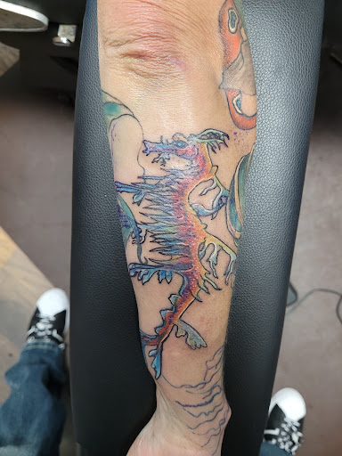 Explore iris flower tattoo ideas, creative tattoo ideas in Bradenton, available at Memory Lane Tattoo Co.