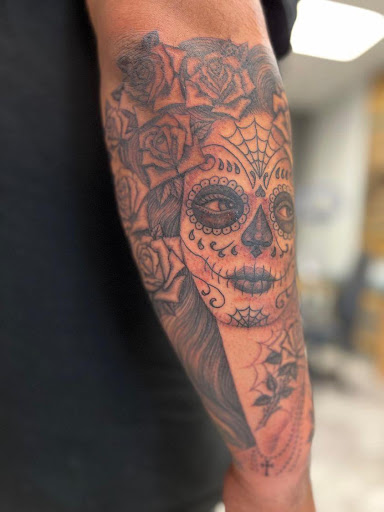 Explore trigun tattoo ideas, creative tattoo ideas in Harrisonburg, available at Mr Lucky Tattoo