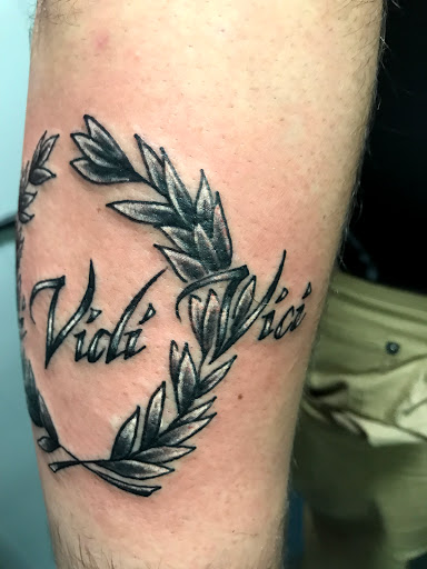 Explore elbow tattoo ideas traditional, creative tattoo ideas in Muncie, available at The Tattoo Studio