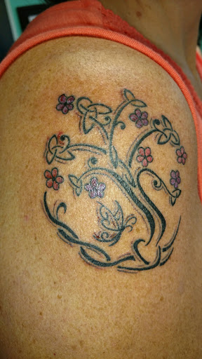 Explore viking arm tattoo ideas, creative tattoo ideas in Geneva, available at Amazing Grace Tattoo & Piercing