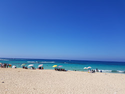 Foto von Minaa Alhasheesh beach mit türkisfarbenes wasser Oberfläche