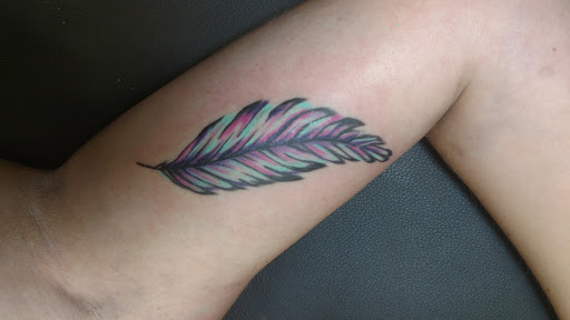 Find biohazard tattoo ideas for your next unique tattoo in Kearney at Bread N Butter Tattoo