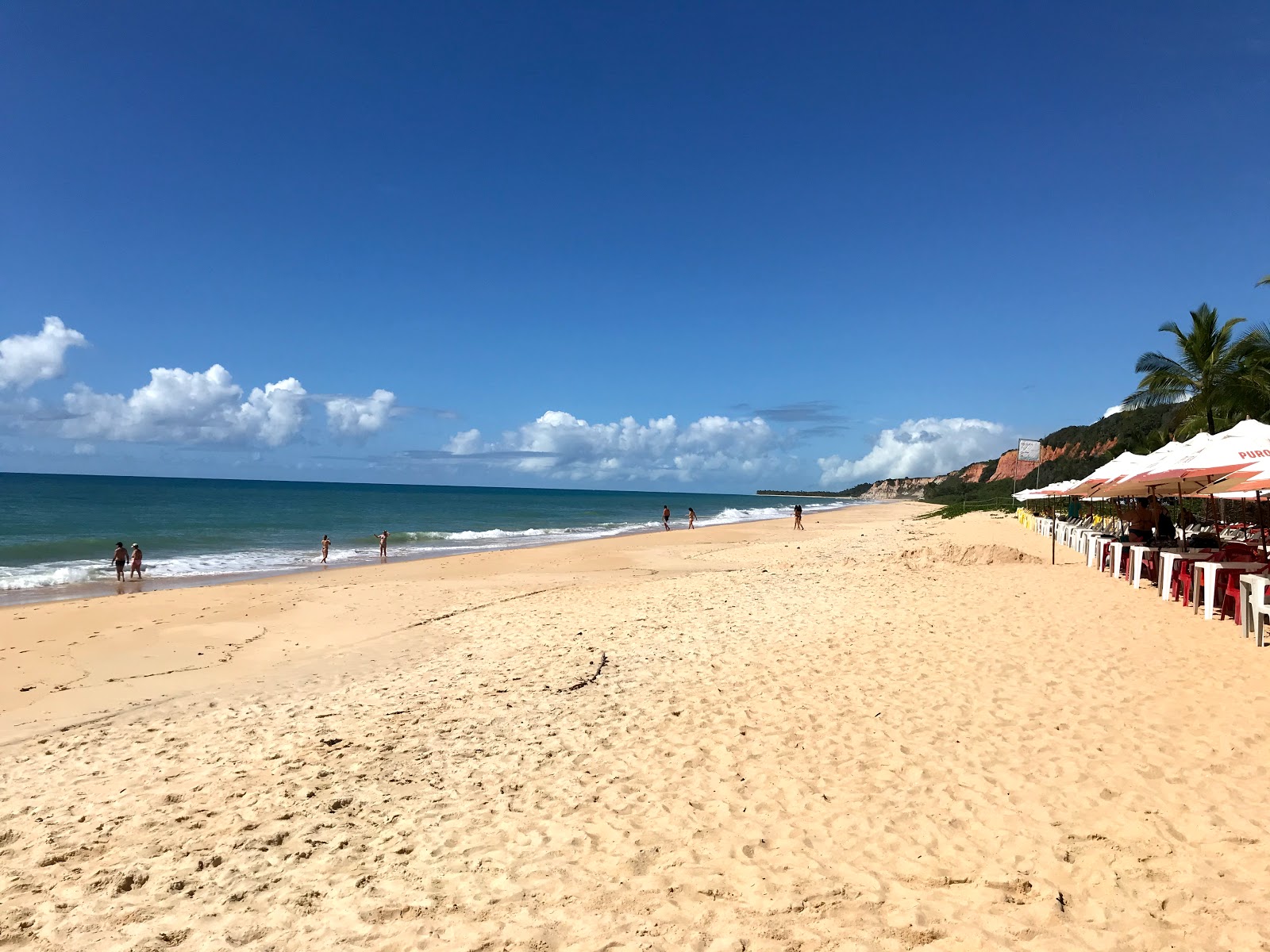 Foto von Taipe Strand mit feiner beiger sand Oberfläche