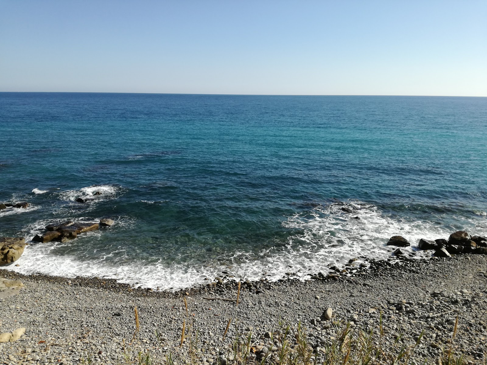 Fotografija La Caletta beach z kratka ravna obala
