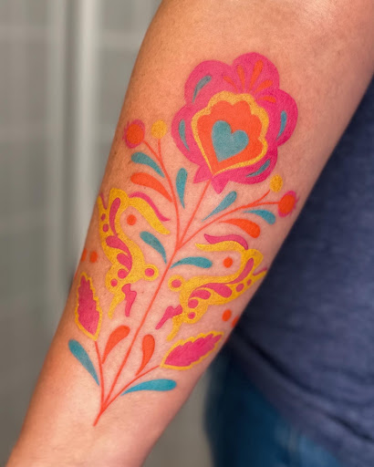Explore front thigh tattoo ideas for women, creative tattoo ideas in Bellefonte, available at Juniper Studio
