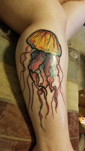 Explore two face tattoo ideas, creative tattoo ideas in Laramie, available at Rolling Tattoo