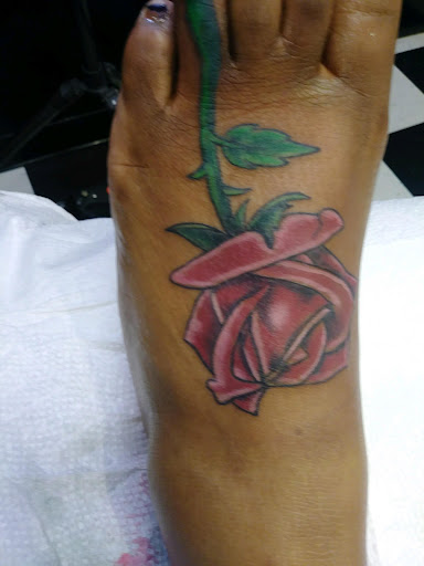 Explore campfire tattoo ideas, creative tattoo ideas in Augusta, available at Mr. Tattoo