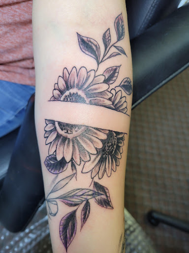 Explore tattoo wrist cover up ideas, creative tattoo ideas in Angola, available at Hoodlum Ink