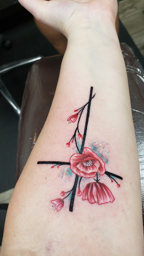Explore female cover up tattoo ideas, creative tattoo ideas in Buford, available at Killer Ink