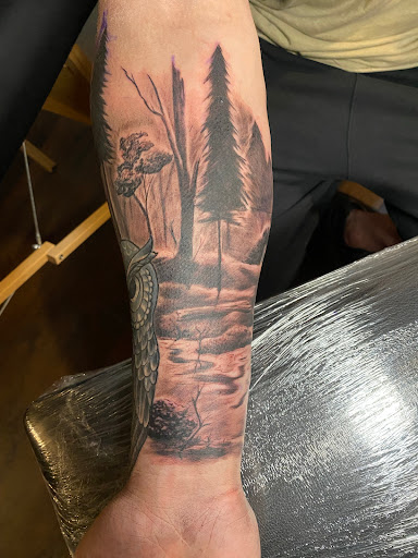 Explore hand tattoo ideas for man, creative tattoo ideas in Pembroke, available at Sovereign Ink, llc