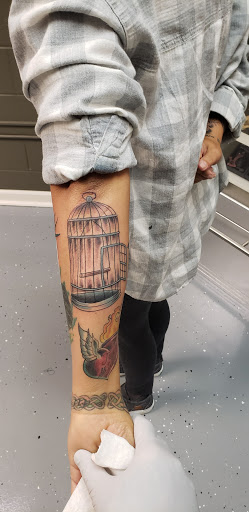 Explore communist tattoo ideas, creative tattoo ideas in Inman, available at Nine Lives Tattoo