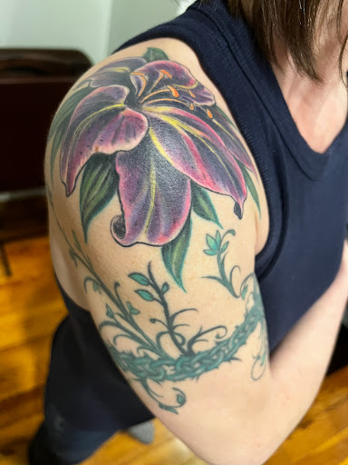 Explore tattoo ideas on ribs, creative tattoo ideas in Danvers, available at Rivers To Roads Tattoo Shop