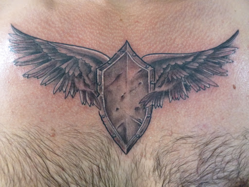 Tattoo Shop «magnum opus tattoo company», reviews and photos, 1817 Padre Blvd #4, South Padre Island, TX 78597, USA