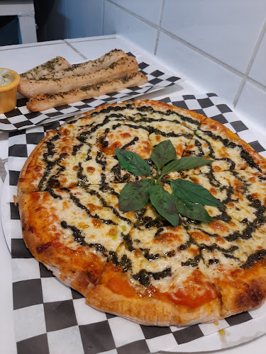 Rollos y Pizza - Tomé