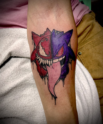 Explore honeycomb tattoo ideas, creative tattoo ideas in Roseburg, available at Black Doubloon Tattoo Parlor