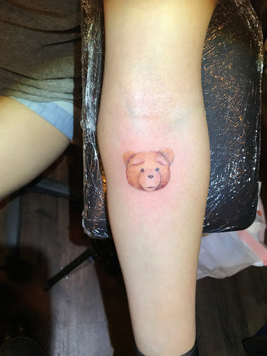 Explore happiness tattoo ideas, creative tattoo ideas in El Monte, available at Baron Art Tattoo & Piercing Studio El Monte