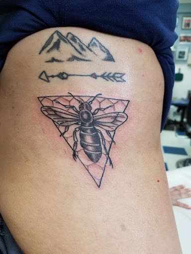 Find traveling tattoo ideas for your next unique tattoo in Libertyville at Art With Atattooed