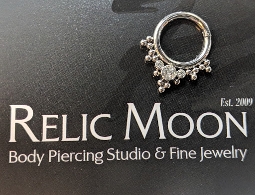 Explore rock tattoo ideas, creative tattoo ideas in Coeur D Alene, available at Relic Moon Fine Jewelry & Body Piercing