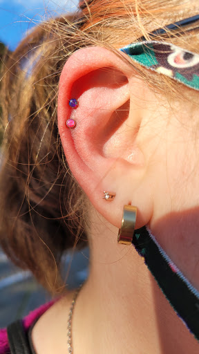 Explore female full back tattoo ideas, creative tattoo ideas in Renton, available at Obelisk Body Piercing & Fine Jewelry