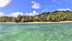 Foto di Aitutaki Beach con costa lunga e dritta