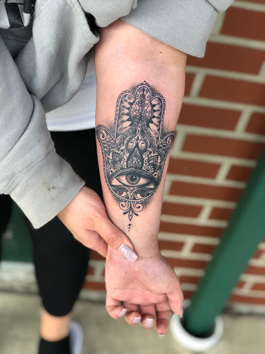 Explore star tattoo ideas for females, creative tattoo ideas in Lockport, available at Archer Ink Tattoo