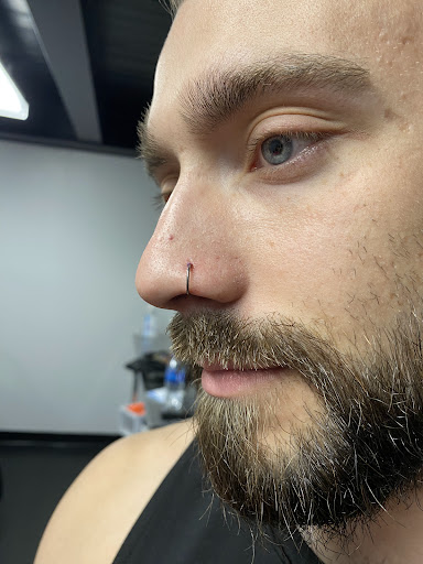 Explore back tattoos ideas guys, creative tattoo ideas in Oswego, available at Bodified