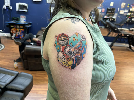 Explore couple tattoo ideas with meaning, creative tattoo ideas in Cocoa, available at Rorschach Tattoo Shop and Piercing Studio