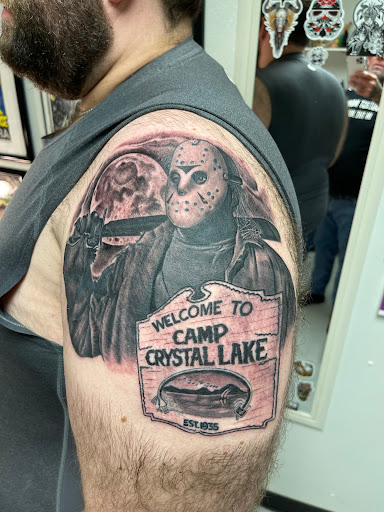 Explore tattoo cover up ideas on leg, creative tattoo ideas in Marietta, available at Monkeys Uncle Tattoo