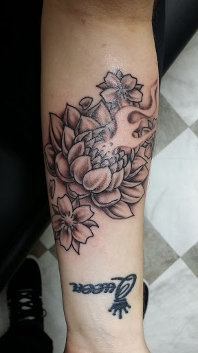 Explore thumb print tattoo ideas, creative tattoo ideas in Paducah, available at The Tattoo Shop