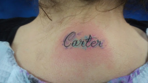 Tattoo Shop «Liquid Tattoo», reviews and photos, 16583 Old U.S. 27, Lansing, MI 48906, USA