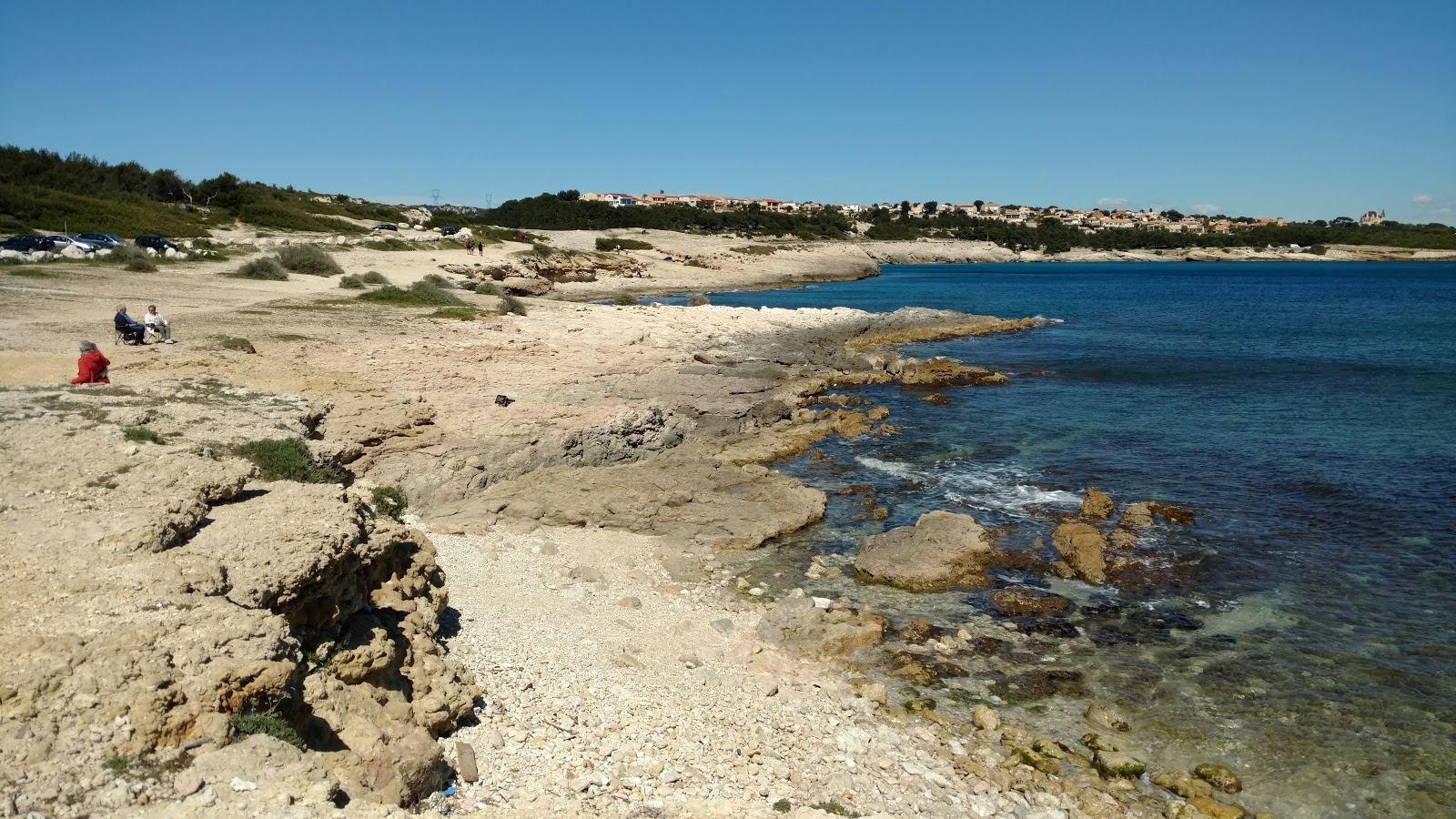 Foto di Plage Des Tamaris con una superficie del terreno roccioso